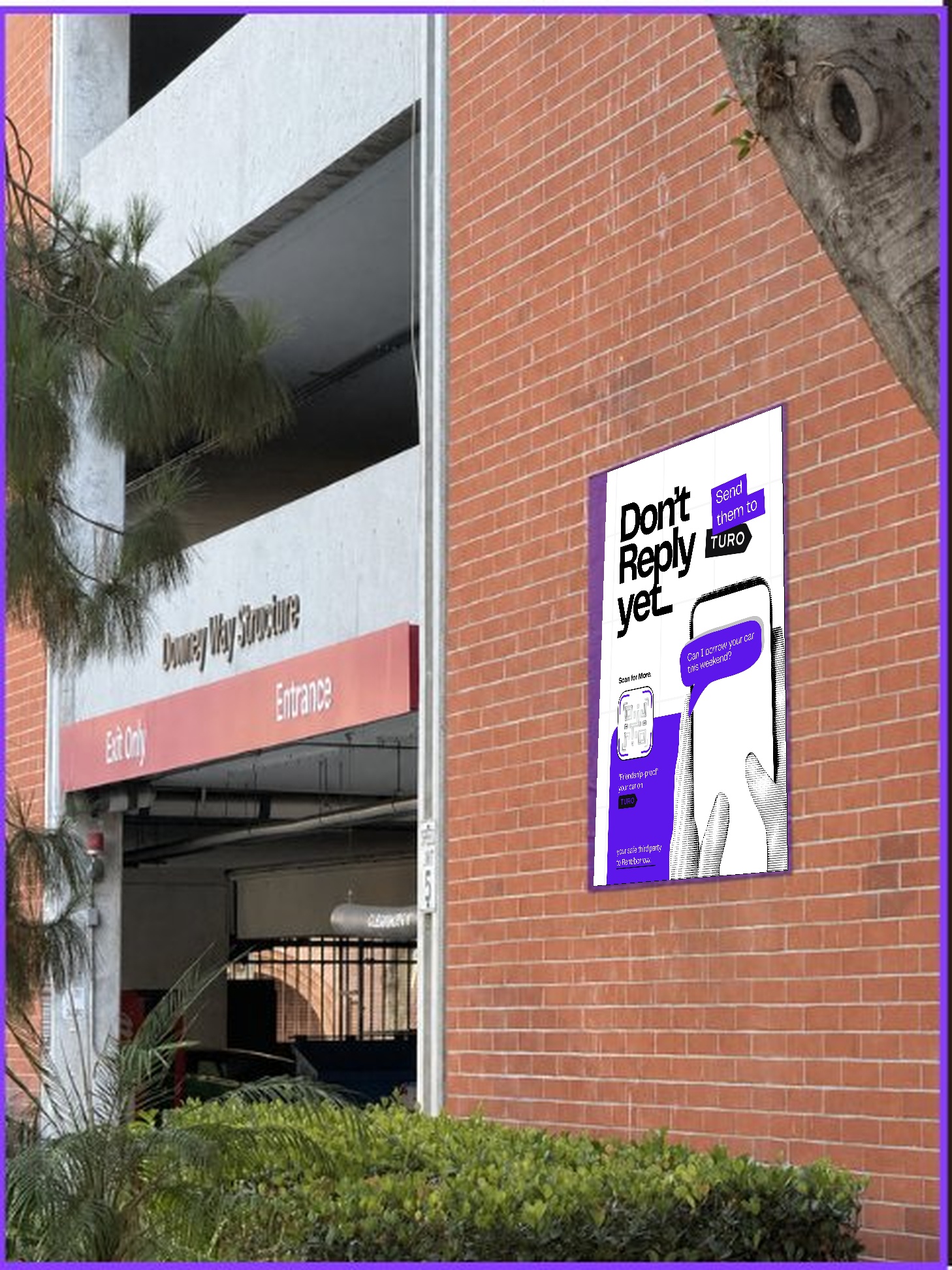 Turo U poster mounted on a USC parking lot wall